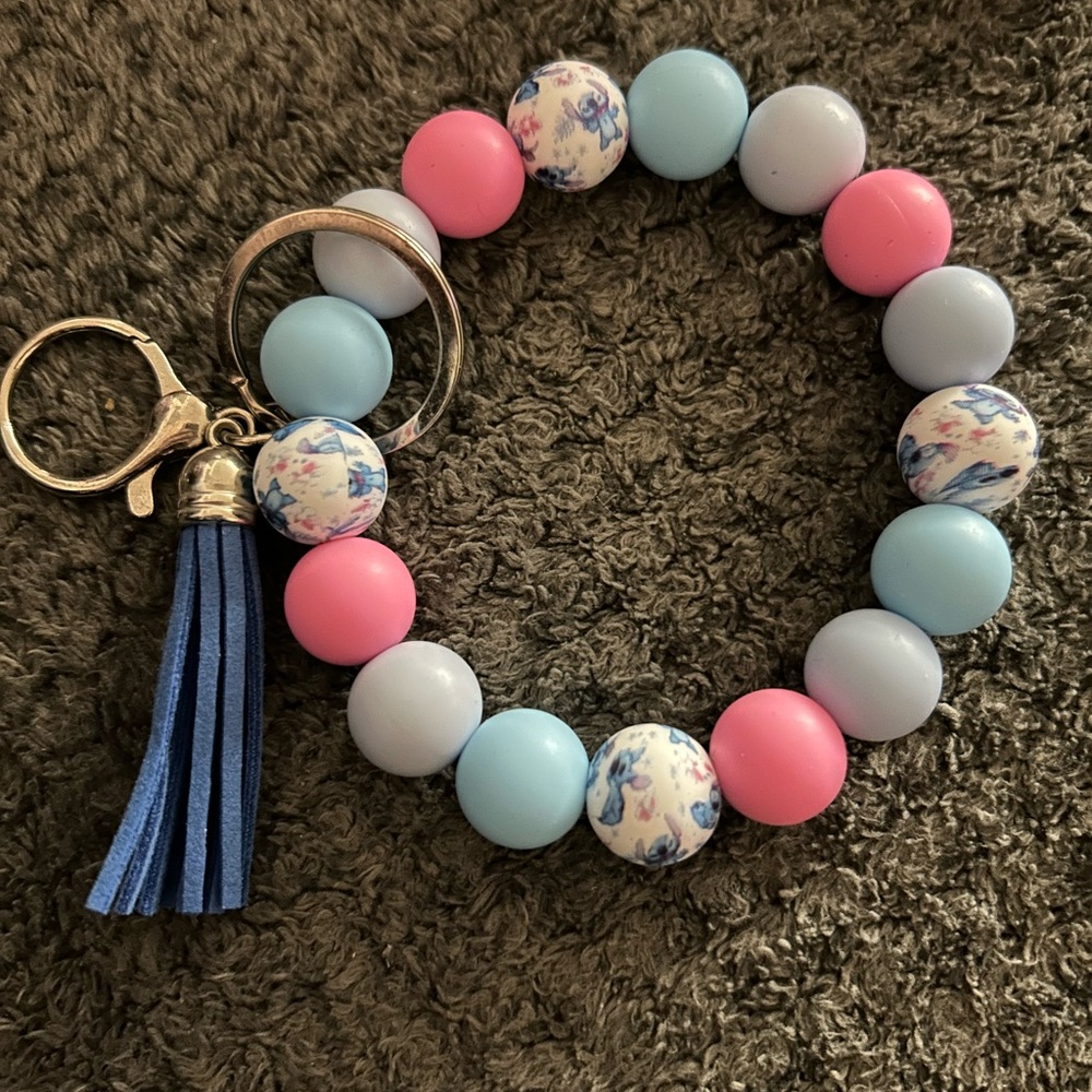 StitchBeaded Keychain Bracelet with Floral Accent and Tassel - Pink & Light Blue